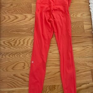 Lululemon Red/Orange Leggings. Size 6, 25in.